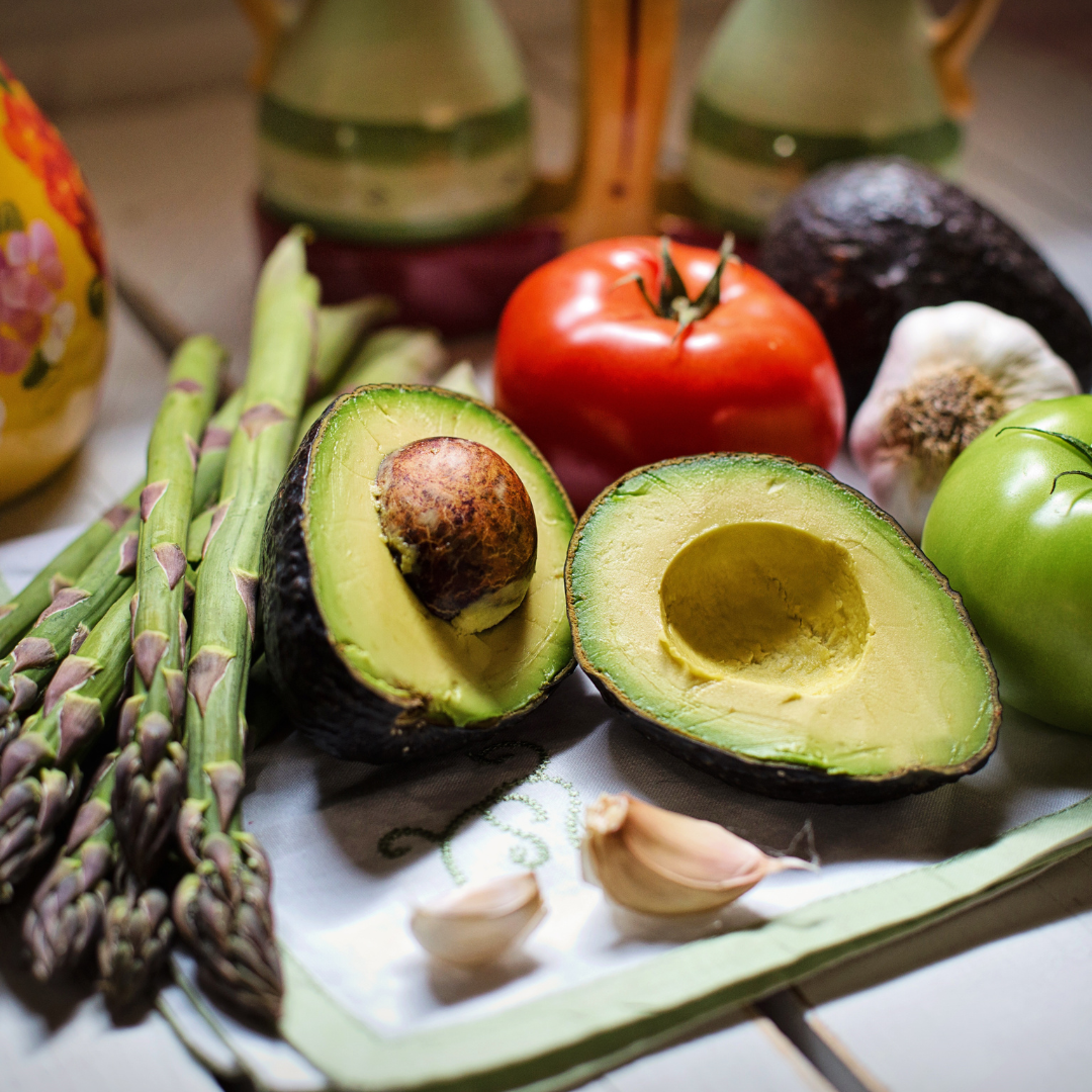 magnesium rich foods, including avocados, asparagus and tomatoes.